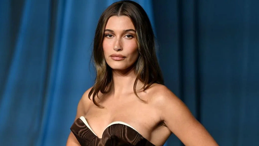 Hailey Bieber in yellow string bikini Instagram selfie March 2026