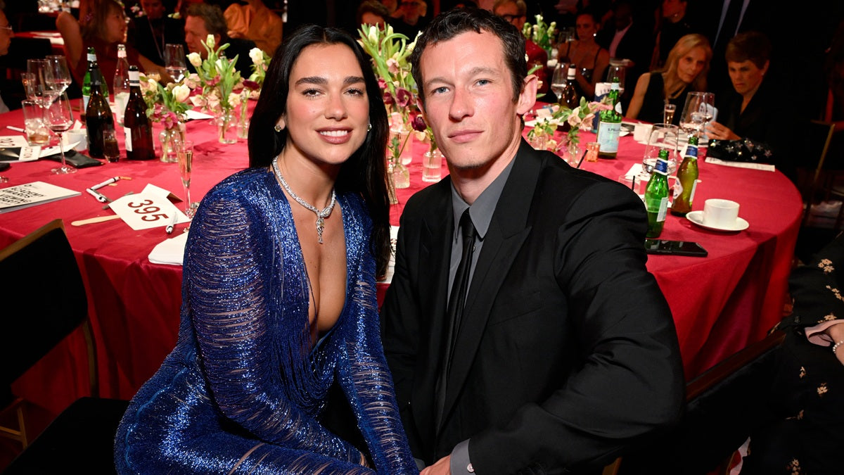 Dua Lipa in gold Oséree bikini top at California beach with Callum Turner, March 2026