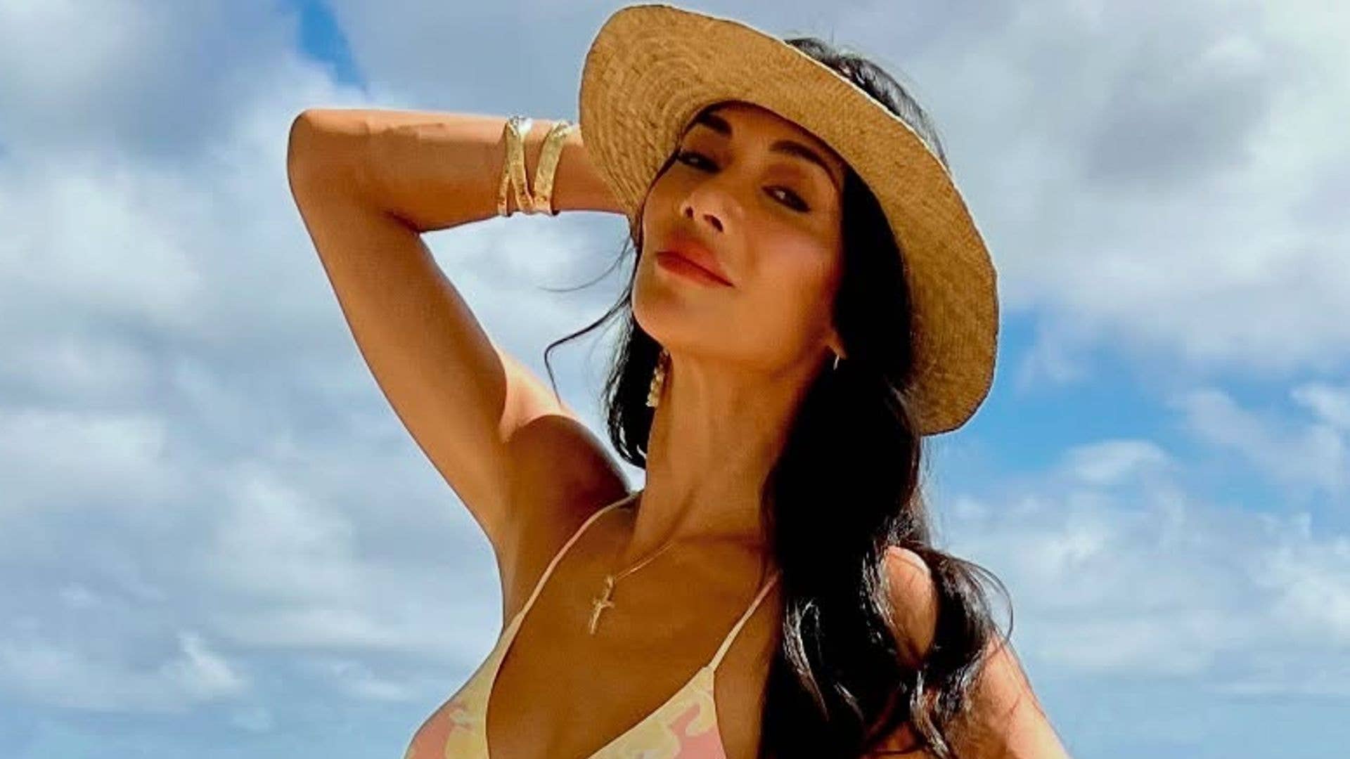 Nicole Scherzinger in bikini on beach vacation January 2026