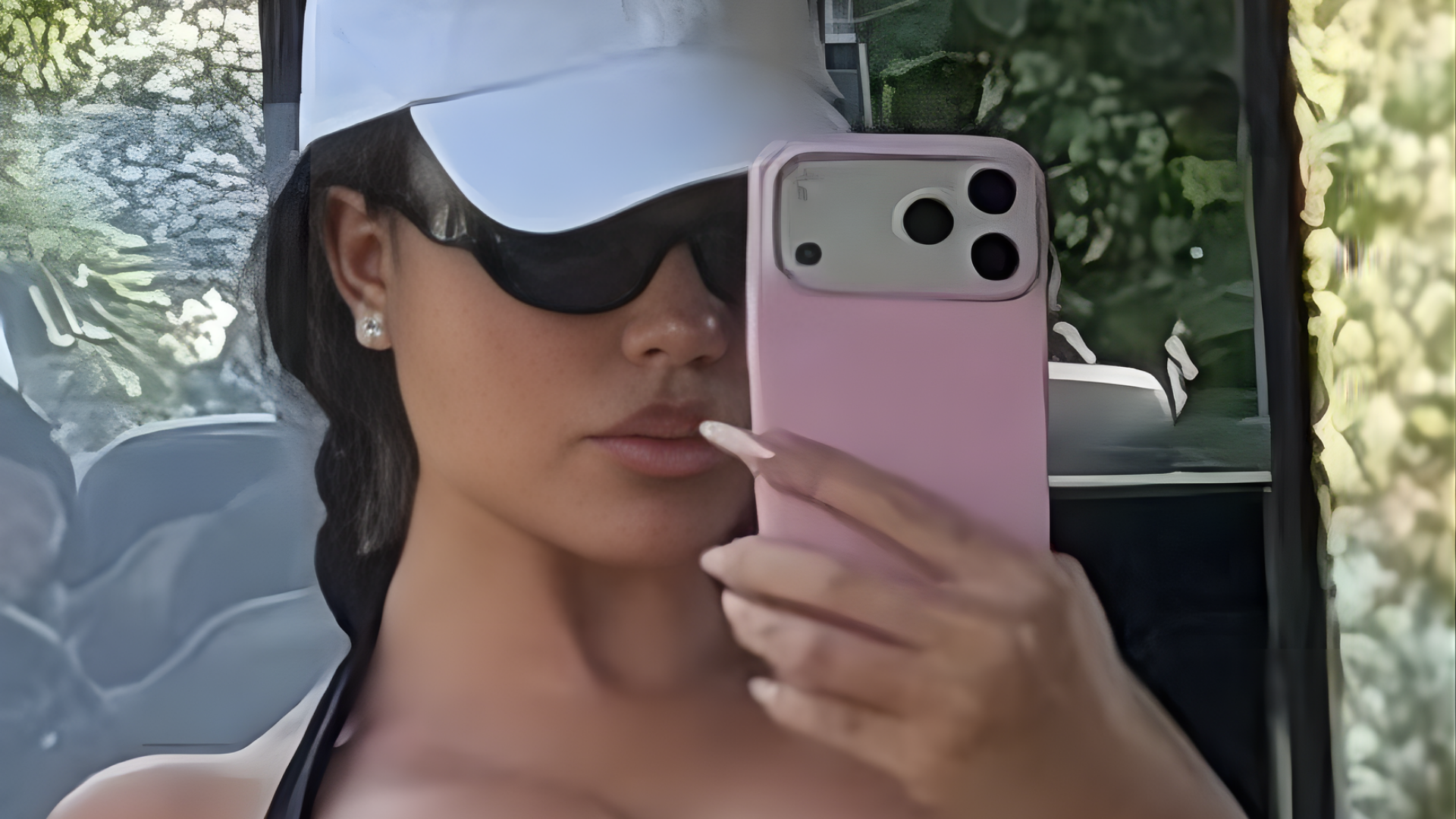 Georgina Rodriguez in a red string bikini on the beach in Madeira