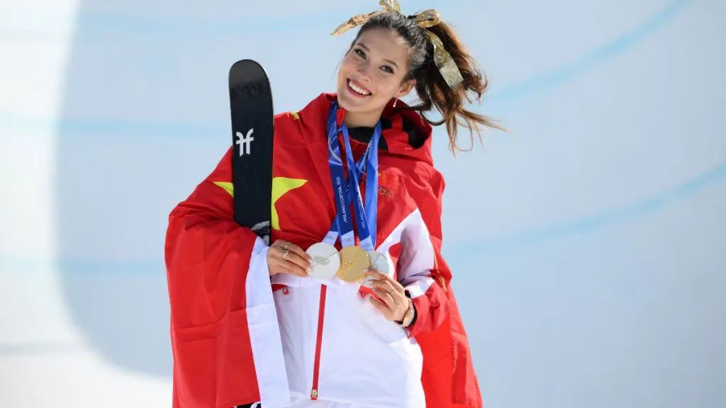 Eileen Gu in a white bikini for Sports Illustrated Swimsuit 2025, Olympic gold medalist