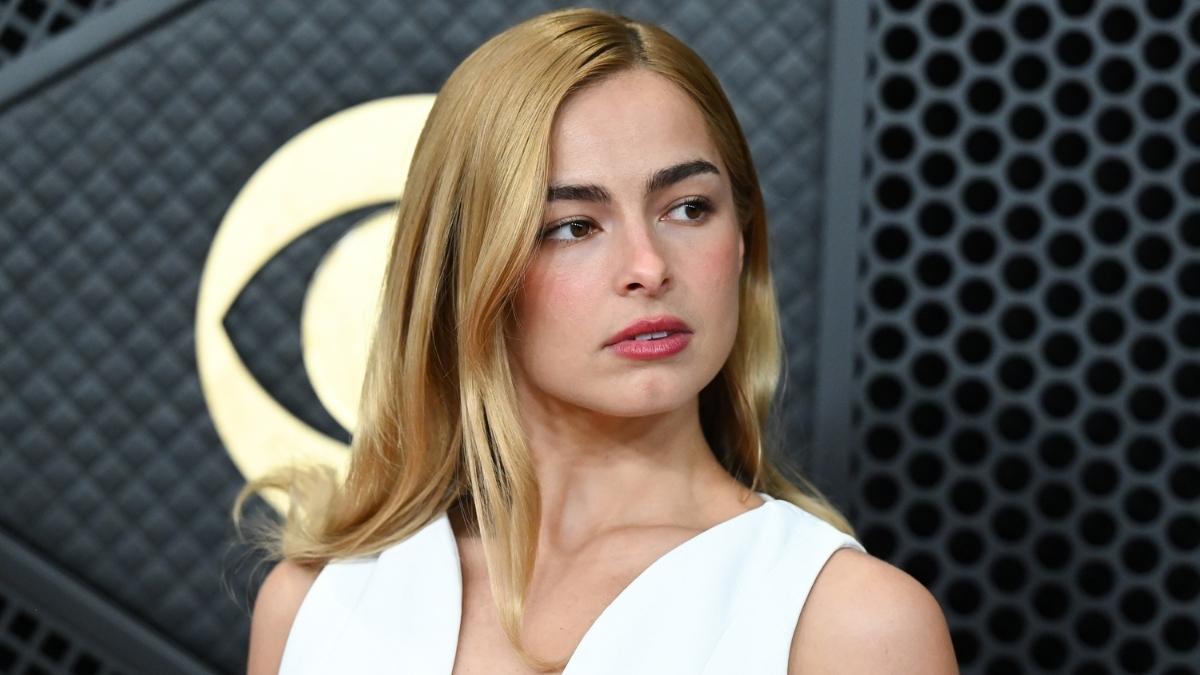 Addison Rae in red knot-detail triangle bikini outdoors, spring 2026