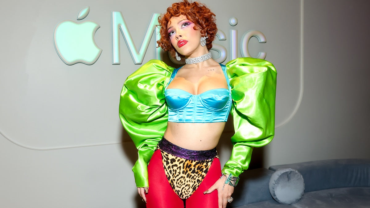 Doja Cat in metallic fringe bikini top over turquoise sheer catsuit at Tour Ma Vie 2026 Santiago Chile concert