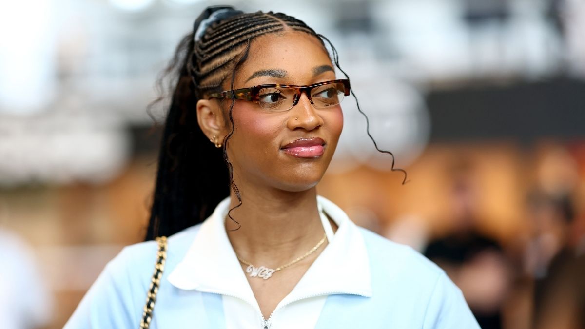 Angel Reese in strappy string bikini on yacht vacation