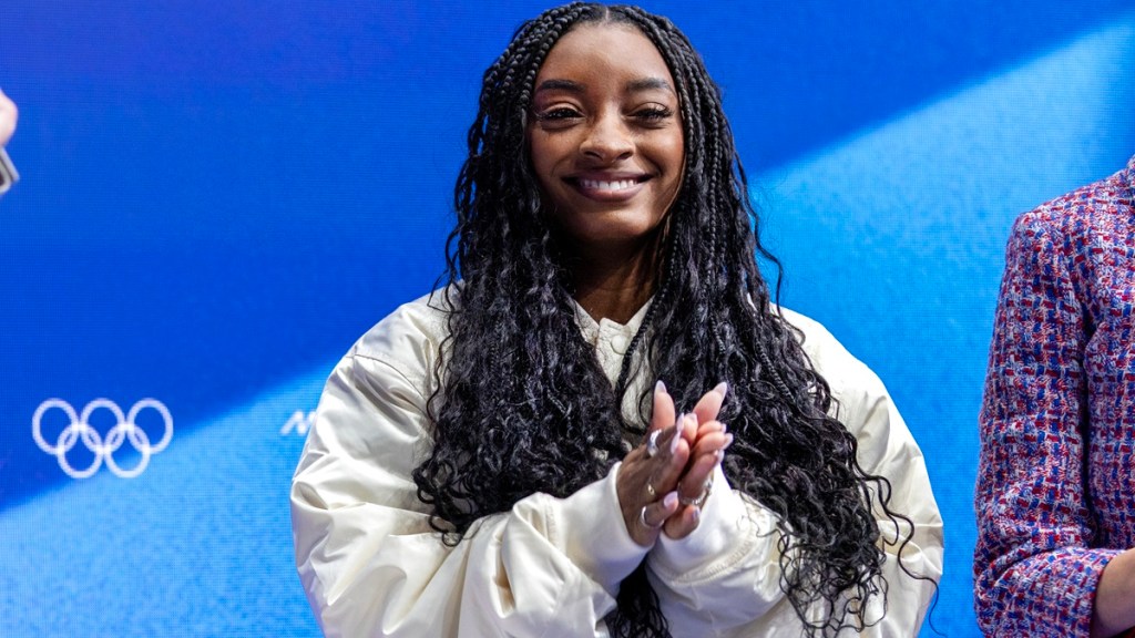 Simone Biles in black string bikini celebrating 29th birthday