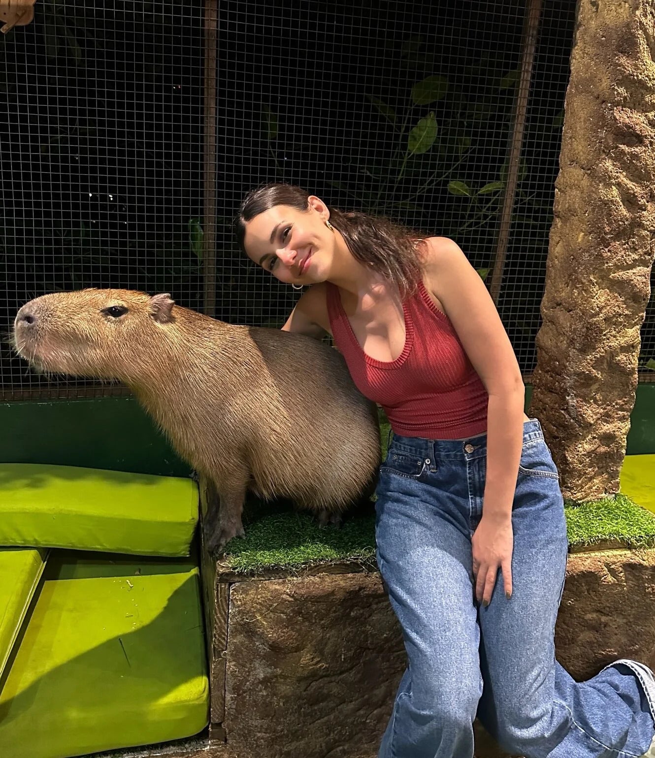Victoria Justice in a striped bikini by the infinity pool in Koh Samui Thailand