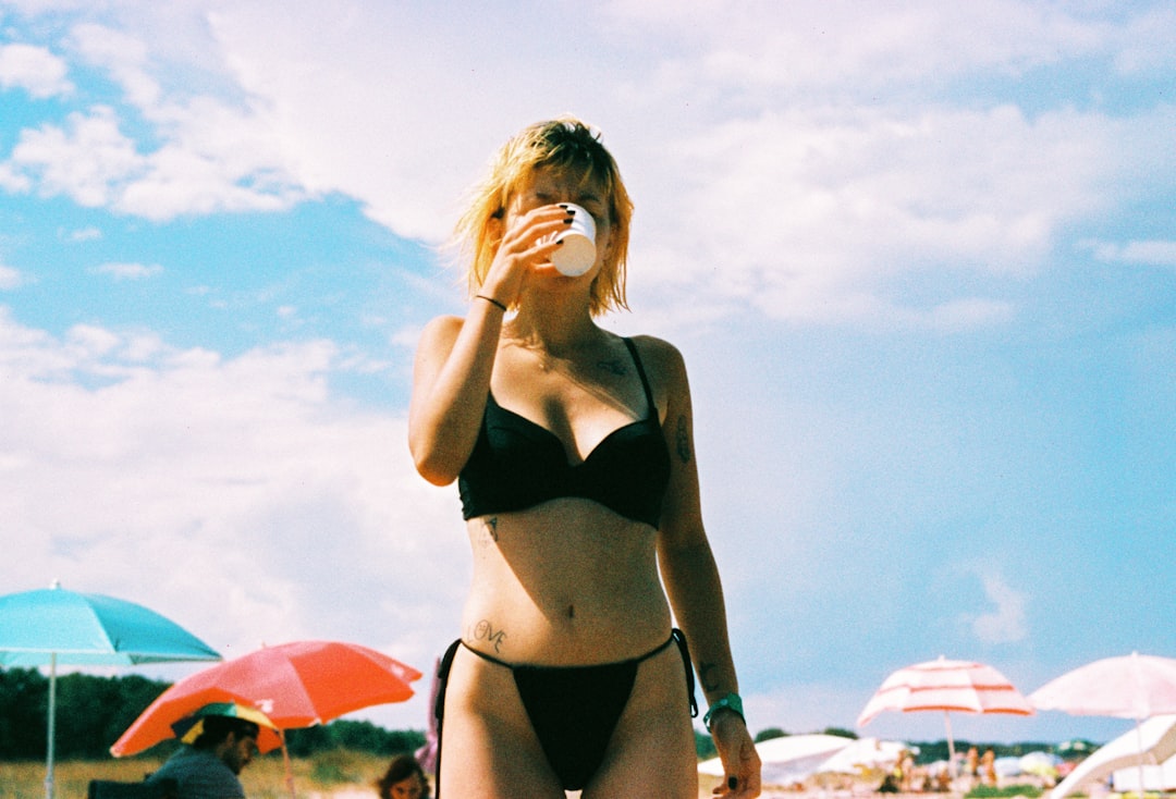 Woman in bikini on the beach - celebrity bikini trends 2026