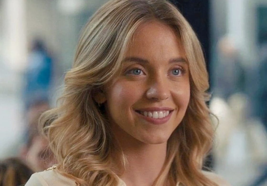 Sydney Sweeney in blue string bikini at the beach, February 2026